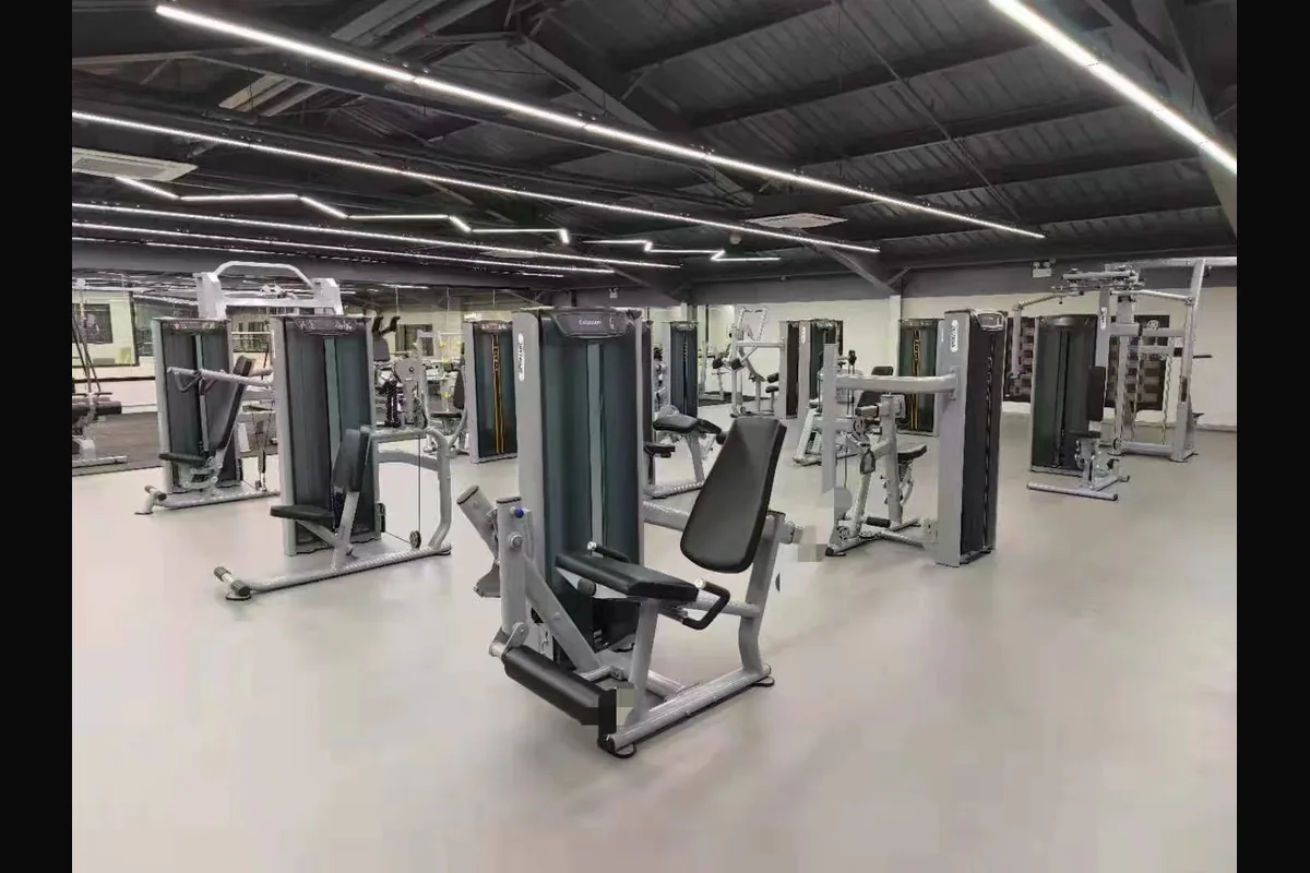Selectorized strength machine room in commercial gym